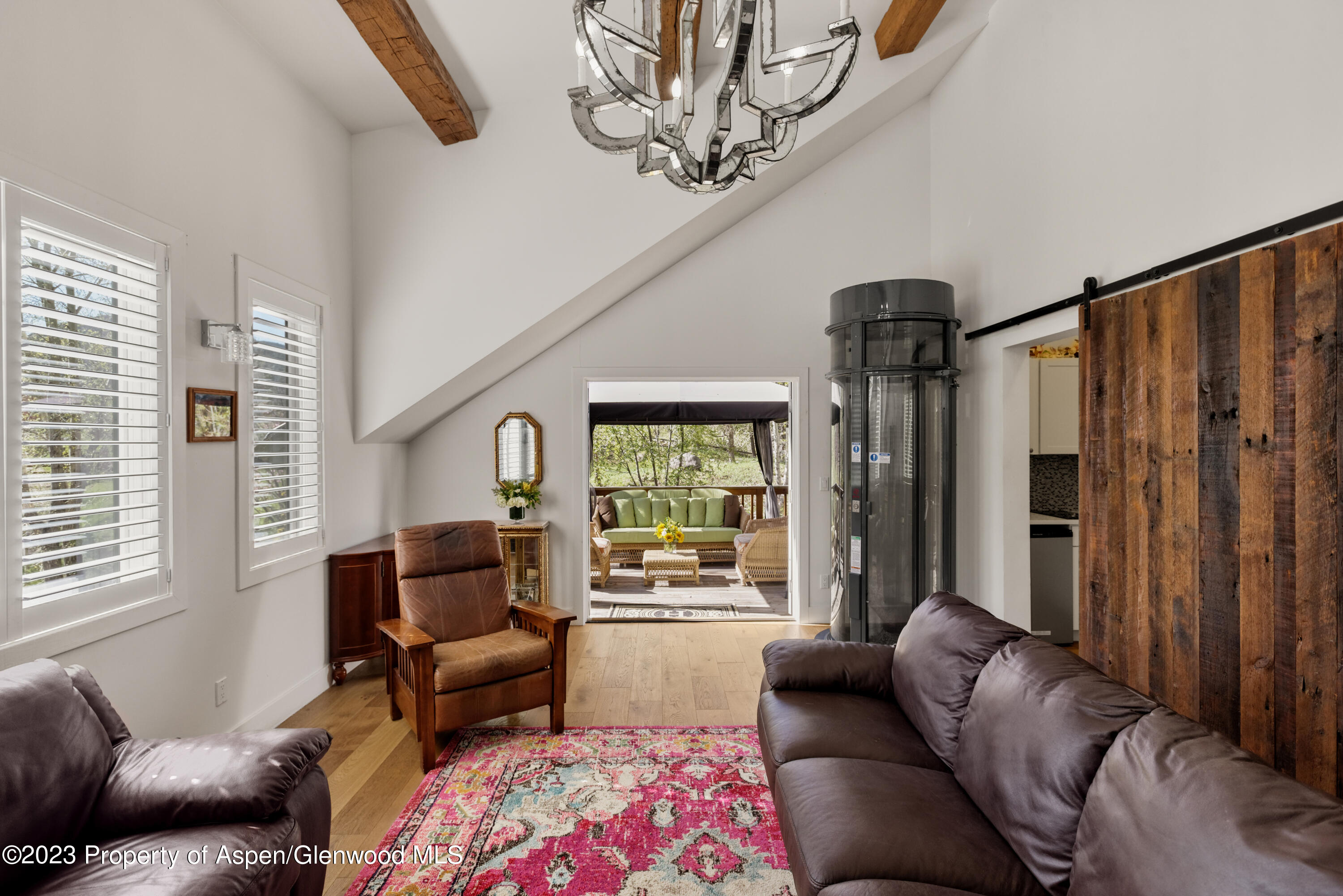 1649 Emma Spur Basalt, CO 81621 - Photo 21 of 35 a living room with furniture and a window