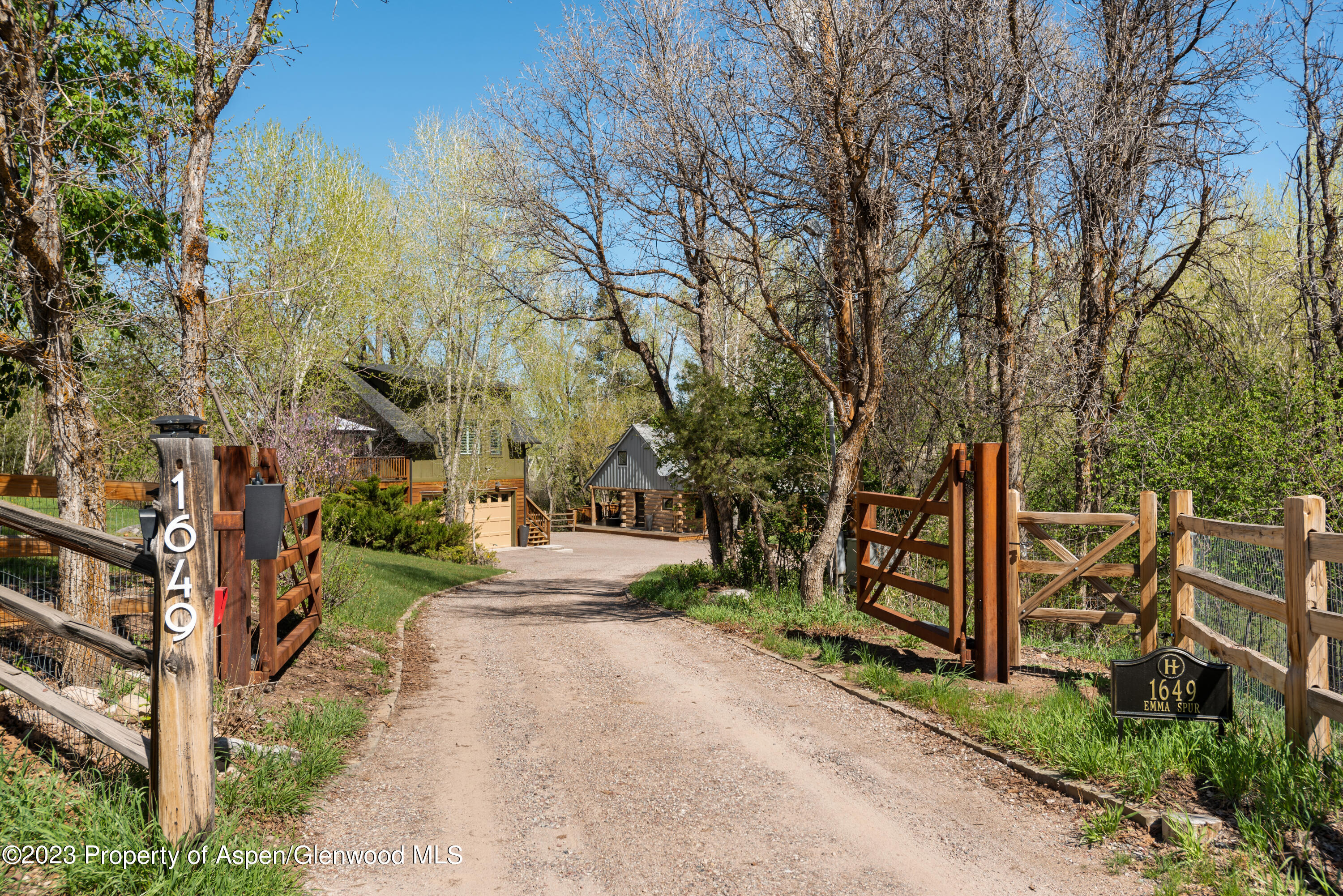 1649 Emma Spur Basalt, CO 81621 - Photo 31 of 35 a view of a street with large trees
