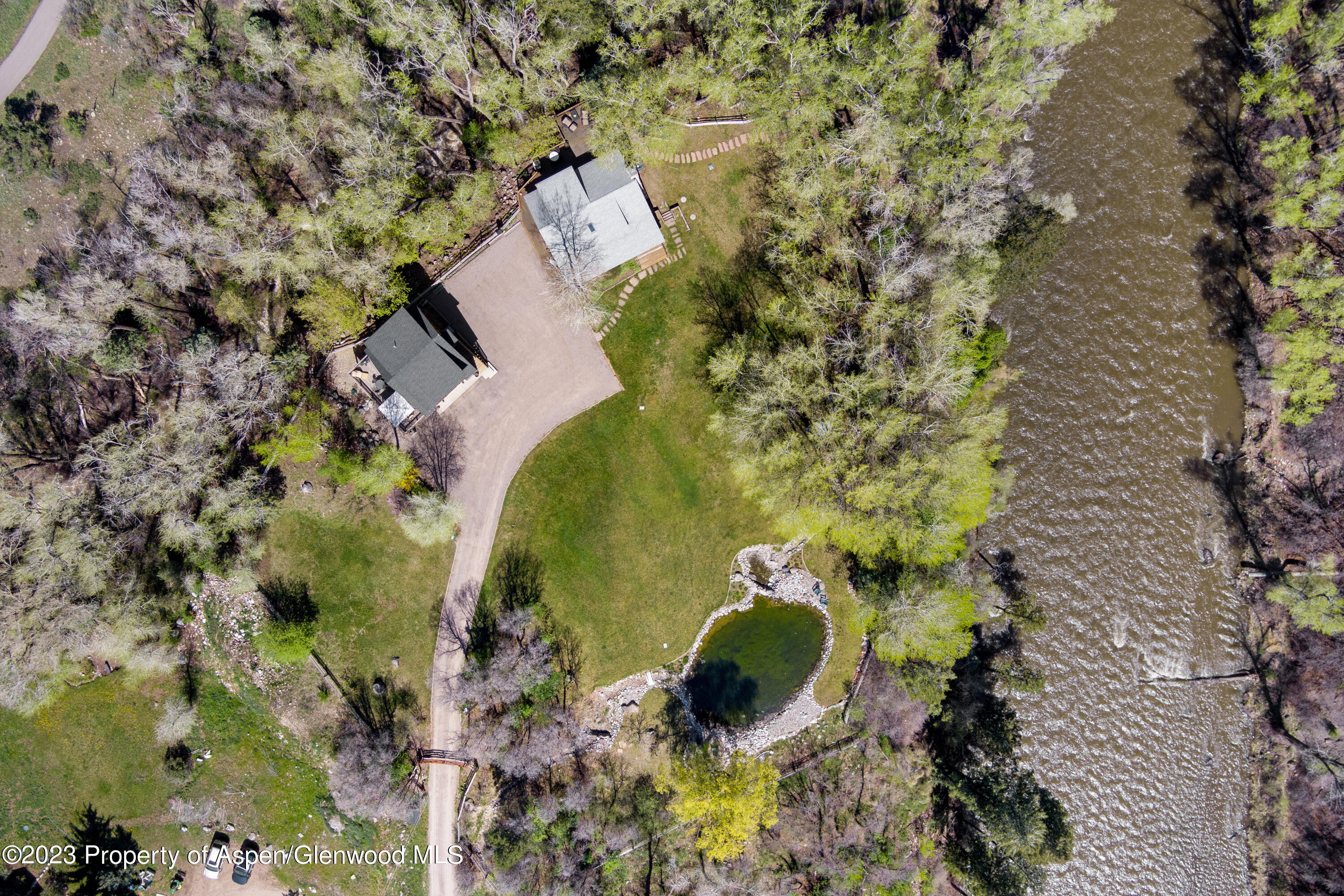 1649 Emma Spur Basalt, CO 81621 - Photo 35 of 35 an aerial view of a house with a yard and swimming pool