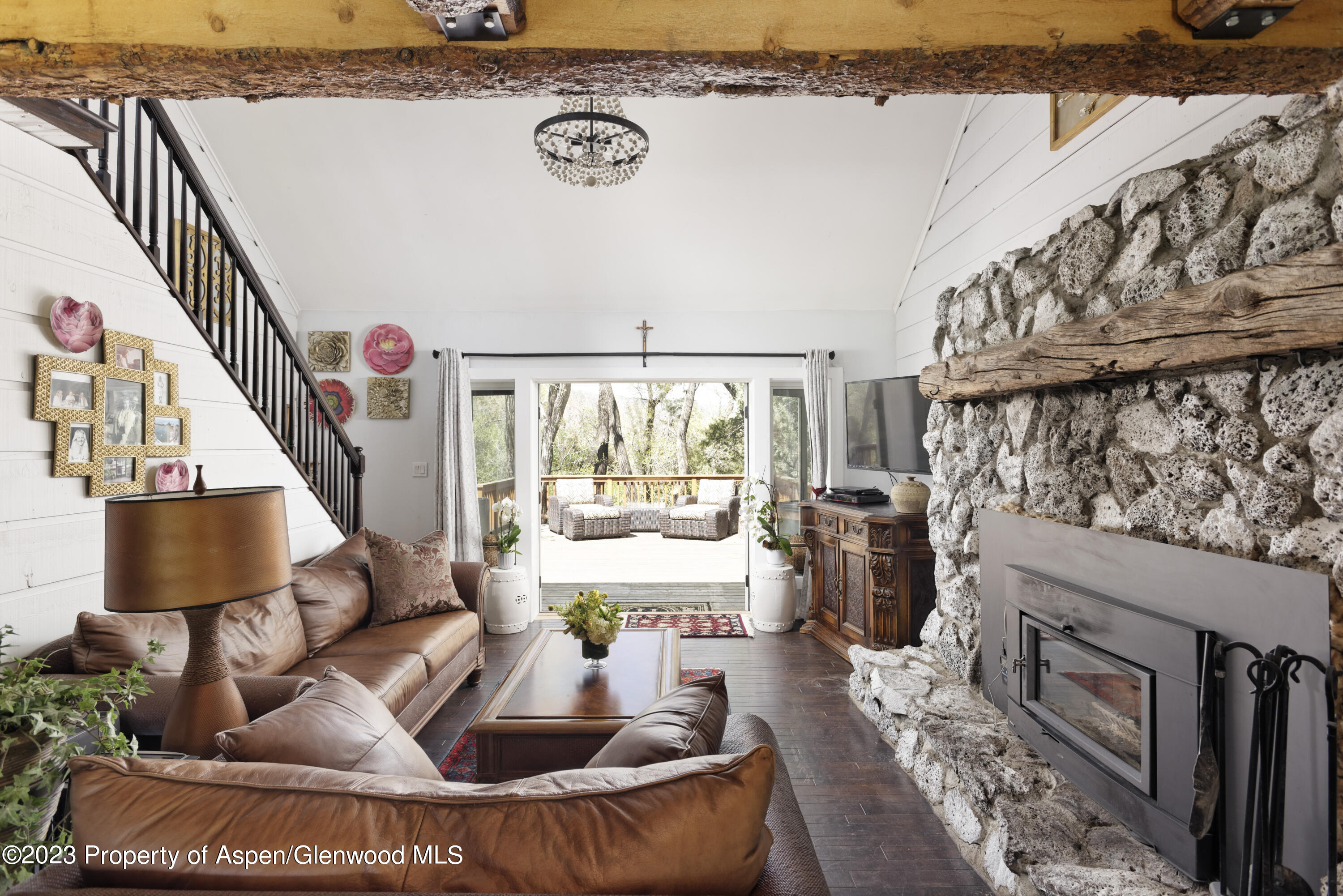 1649 Emma Spur Basalt, CO 81621 - Photo 4 of 35 a living room with furniture and a flat screen tv