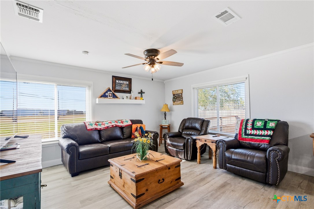 201 Pheasant Drive Victoria, TX 77905 - Photo 9 of 20 a living room with furniture and a large window