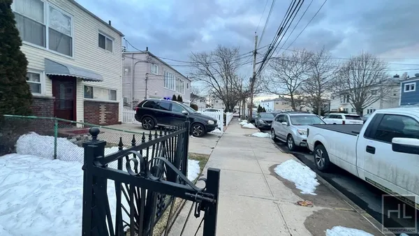 a view of a patio with couches and table and chairs