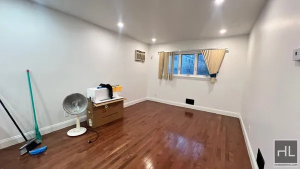 a view of workspace with wooden floor