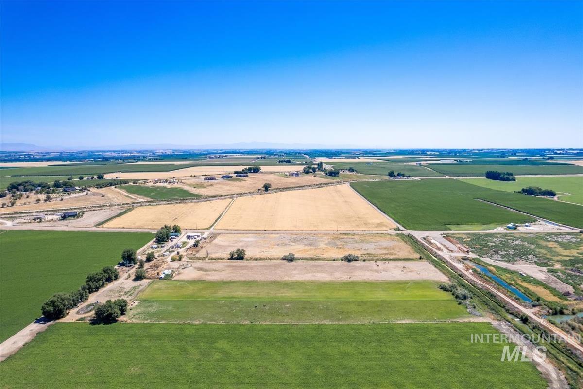23743 Stephen Lane Parma, ID 83660 - Photo 7 of 34 Aerial view of sparsely populated area featuring large plots for crops