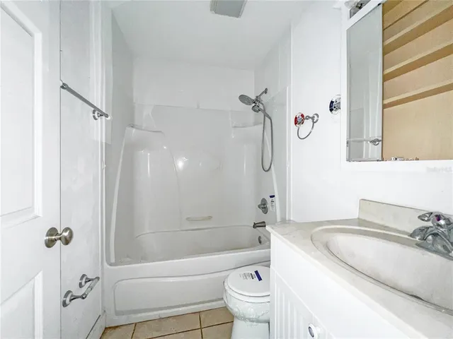 a view of a hallway with a window