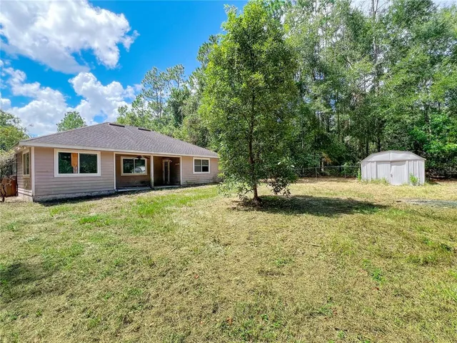 a house view with a garden space