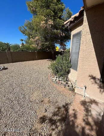 a view of a chairs and tables in the patio