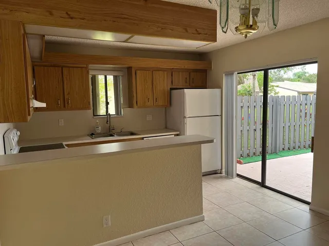 a view of a livingroom with furniture
