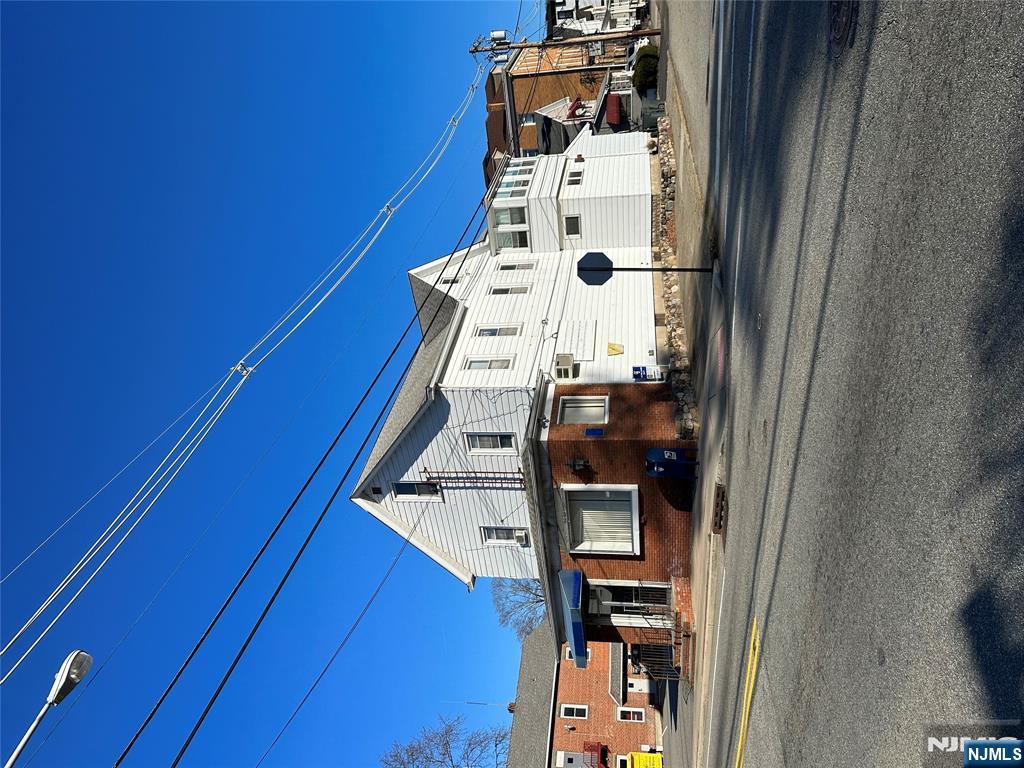 636-3 Ringwood Avenue, Unit 3 Wanaque, NJ 07465 - Photo 1 of 15 a view of white house