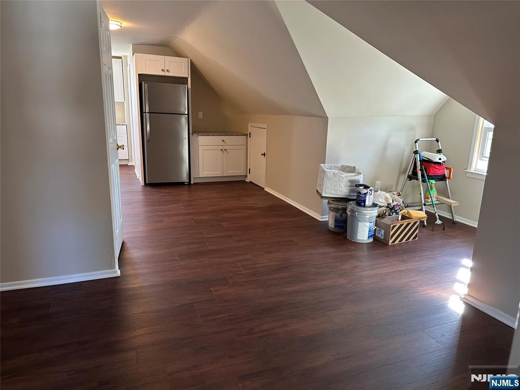 636-3 Ringwood Avenue, Unit 3 Wanaque, NJ 07465 - Photo 12 of 15 a room with wooden floor and cabinets