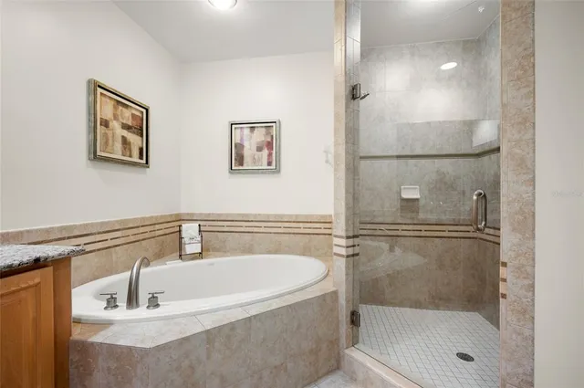 a view of hallway with stairs and furniture