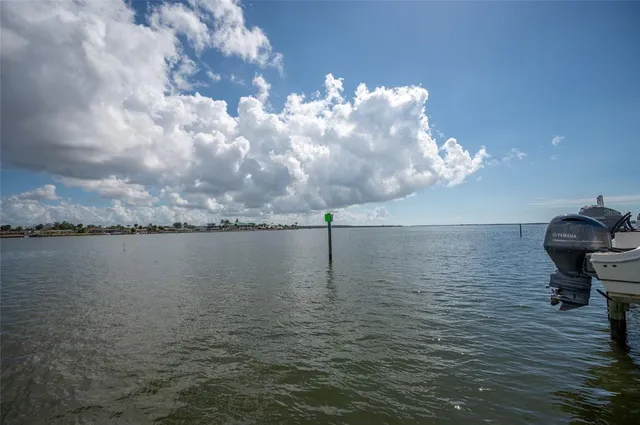 a view of a lake with a building in front of it