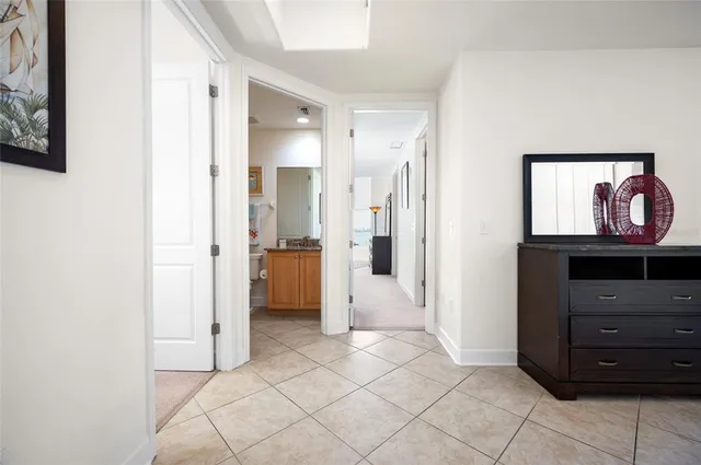a kitchen with cabinets and stainless steel appliances