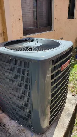 a kitchen with a sink and a microwave oven