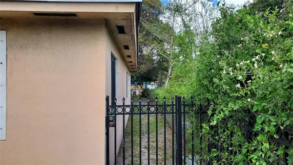 a view of a house with a tree