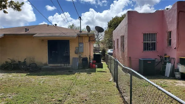 a view of balcony and yard