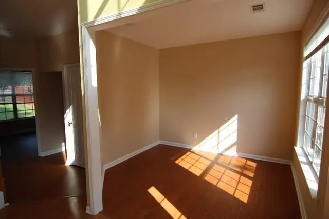 a view of an empty room and window