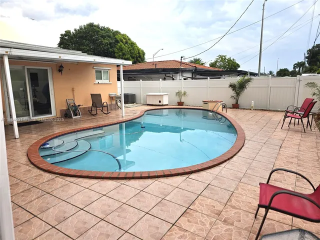 a front view of a house with patio