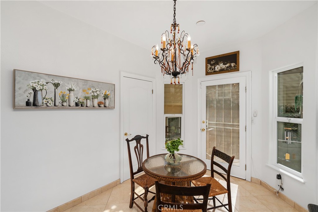 7901 Berger Avenue Playa del Rey, CA 90293 - Photo 18 of 67 a view of a dining room with furniture and chandelier