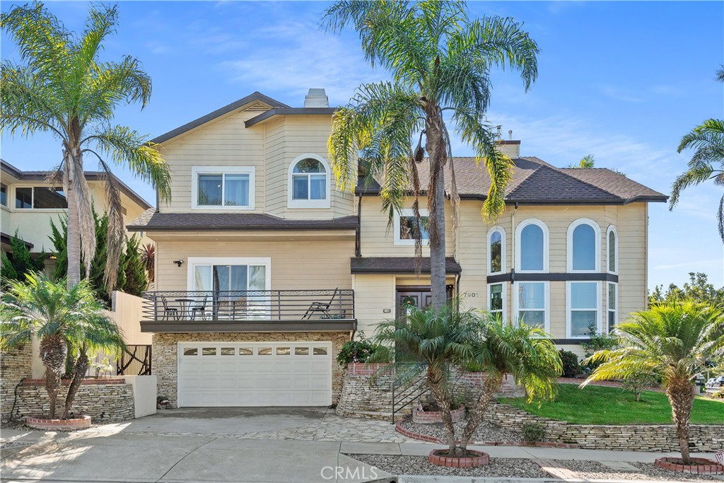 7901 Berger Avenue Playa del Rey, CA 90293 - Photo 2 of 67 a front view of a house with a yard and garage