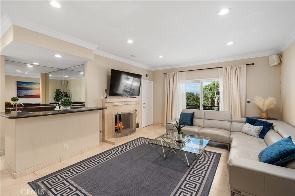 7901 Berger Avenue Playa del Rey, CA 90293 - Photo 26 of 67 a living room with furniture and a fireplace