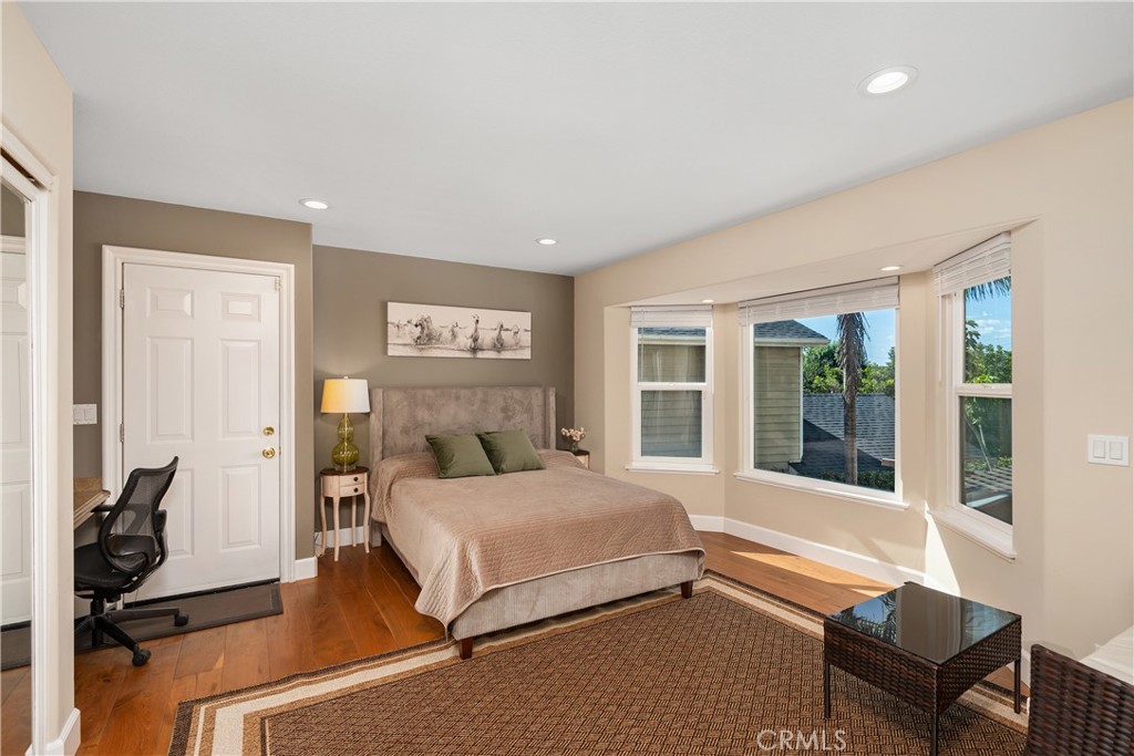 7901 Berger Avenue Playa del Rey, CA 90293 - Photo 29 of 67 a bedroom with a bed and wooden floor