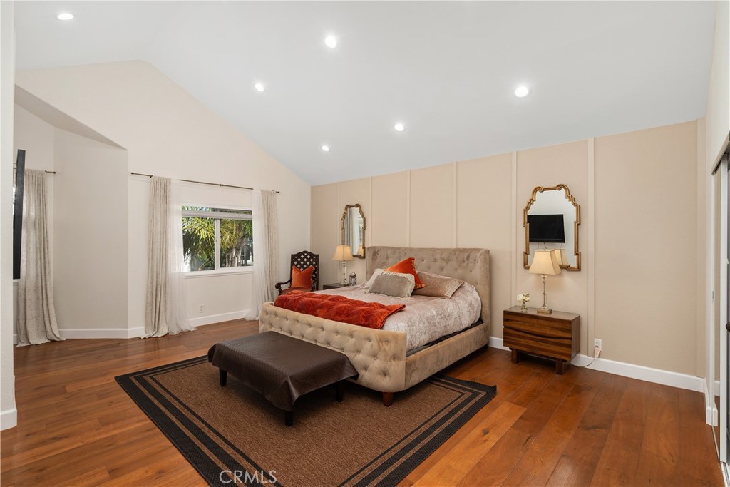 7901 Berger Avenue Playa del Rey, CA 90293 - Photo 34 of 67 a bedroom with a bed window and wooden floor