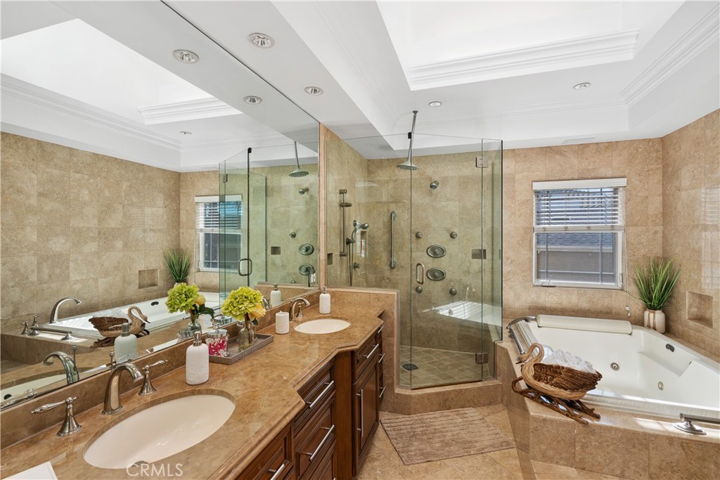 7901 Berger Avenue Playa del Rey, CA 90293 - Photo 40 of 67 a bathroom with a granite countertop tub sink and mirror