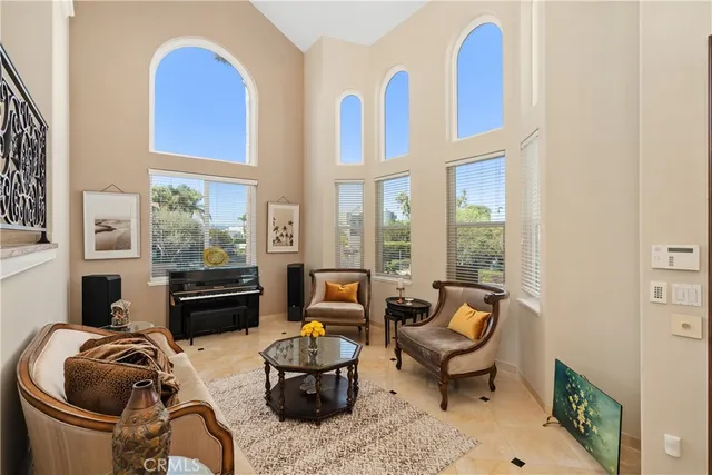 a view of a dining room with furniture and window