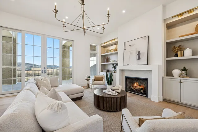 a kitchen with granite countertop a sink and cabinets