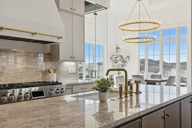 a spacious bedroom with a bed and a fireplace