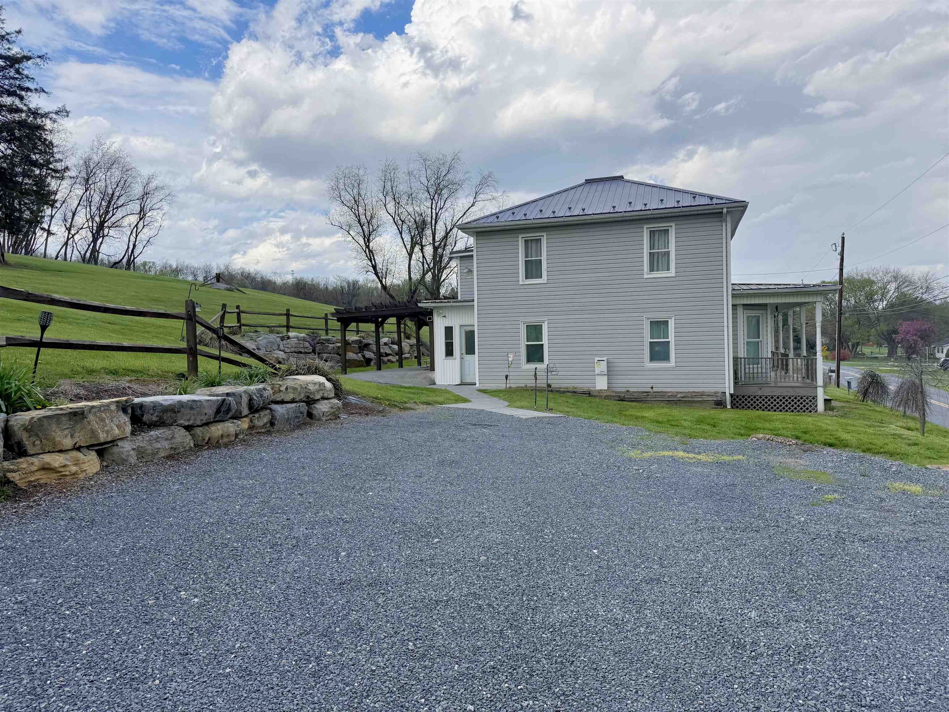 15385 Evergreen Valley Road Timberville, VA 22853 - Photo 44 of 44 a view of a house with backyard and a tree