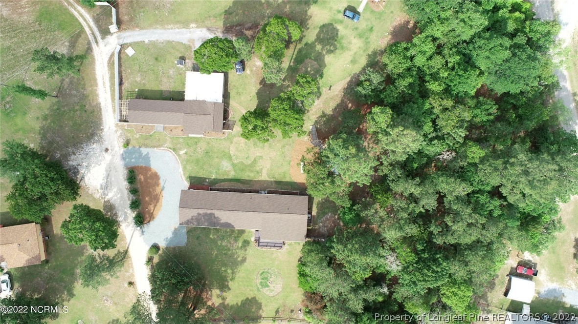 344 J Burns Road Vass, NC 28394 - Photo 39 of 50 an aerial view of a house with a yard