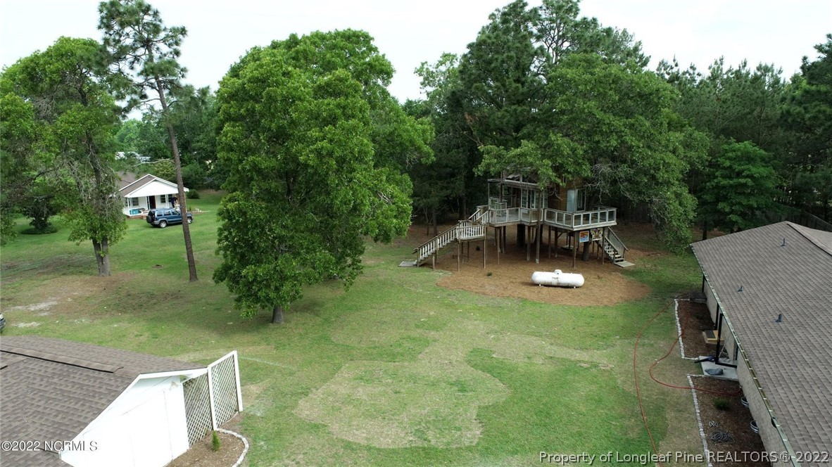 344 J Burns Road Vass, NC 28394 - Photo 41 of 50 a view of a swimming pool with a patio
