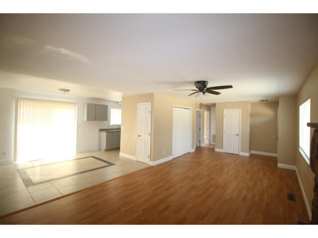 27143 Dersch Road Shingletown, CA 96088 - Photo 14 of 23 Living to dining to kitchen, bedrooms
