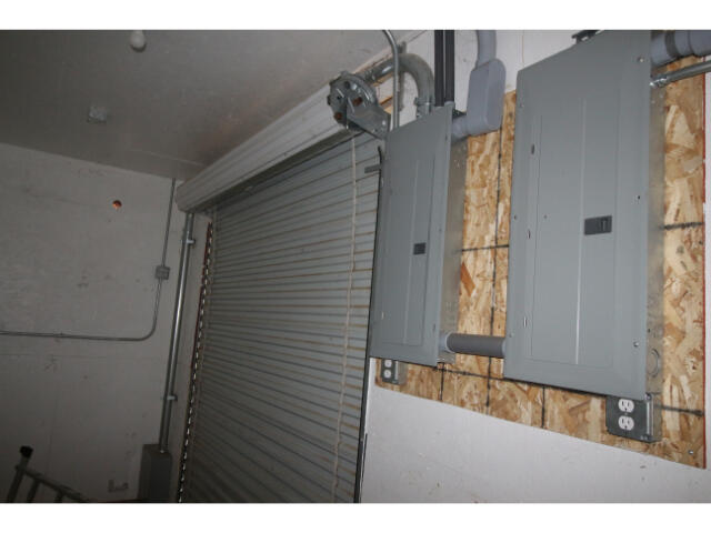 27143 Dersch Road Shingletown, CA 96088 - Photo 5 of 23 Rollup door in shop