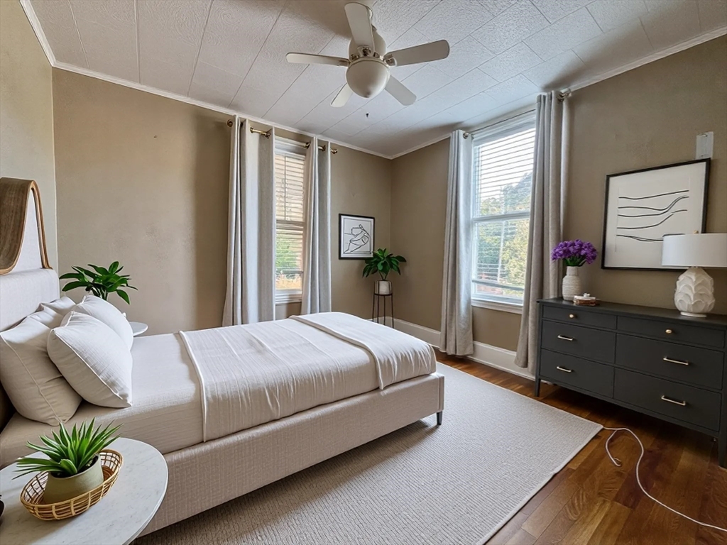 53 Mountford Road Hull, MA 02045 - Photo 12 of 35 a bedroom with a bed and a dresser