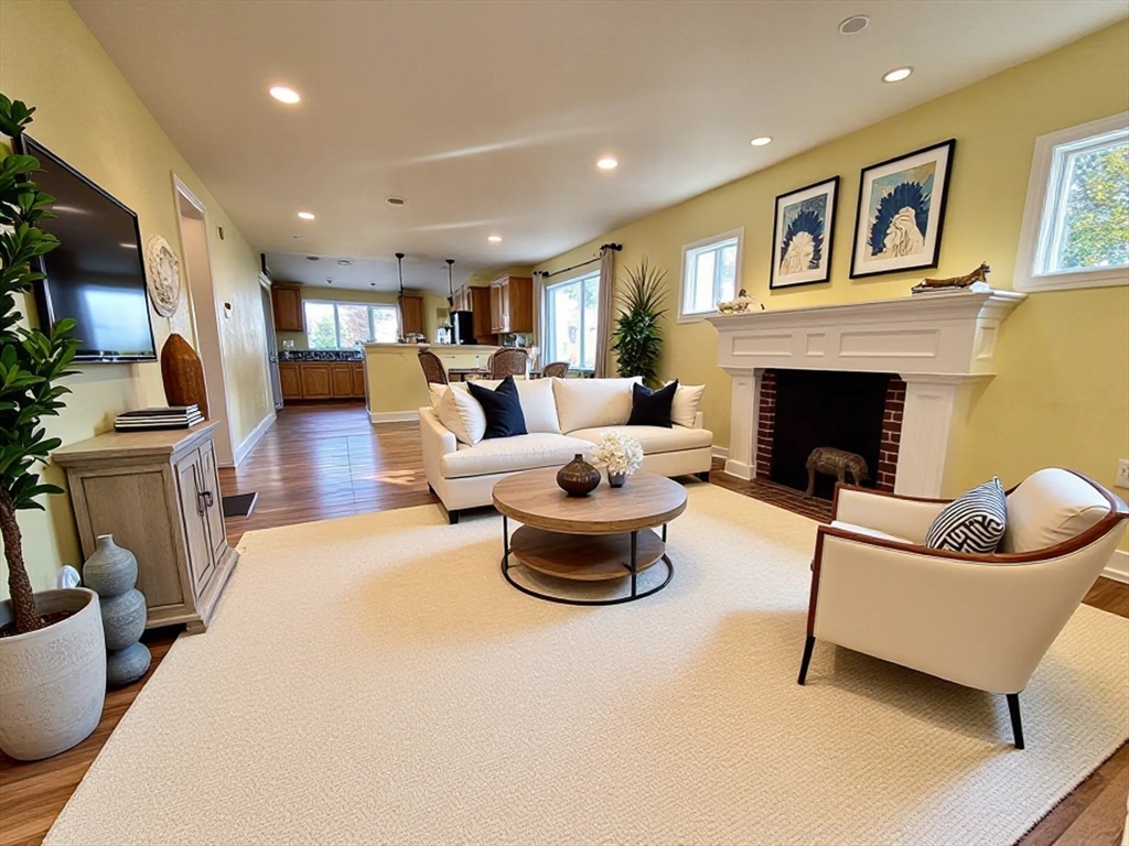 53 Mountford Road Hull, MA 02045 - Photo 2 of 35 a living room with furniture and a fireplace