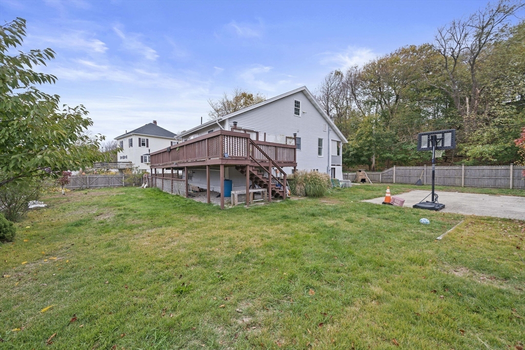 53 Mountford Road Hull, MA 02045 - Photo 25 of 35 a view of a house with backyard and porch