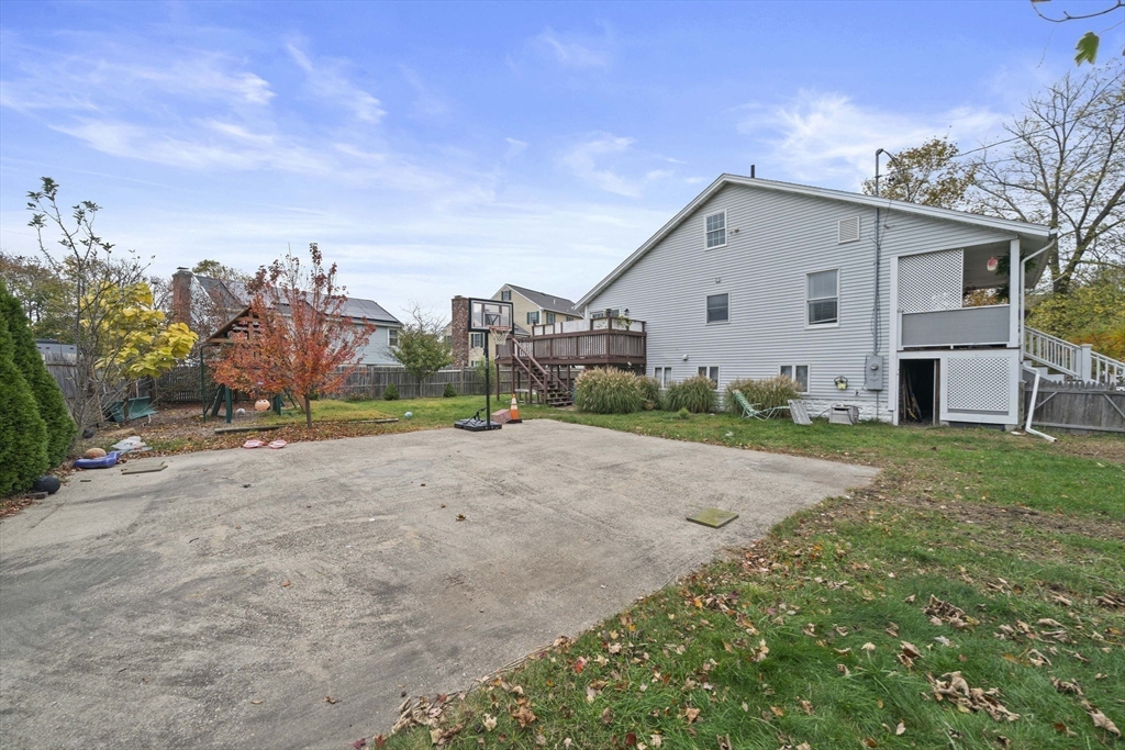 53 Mountford Road Hull, MA 02045 - Photo 26 of 35 a view of a house with a yard and garage