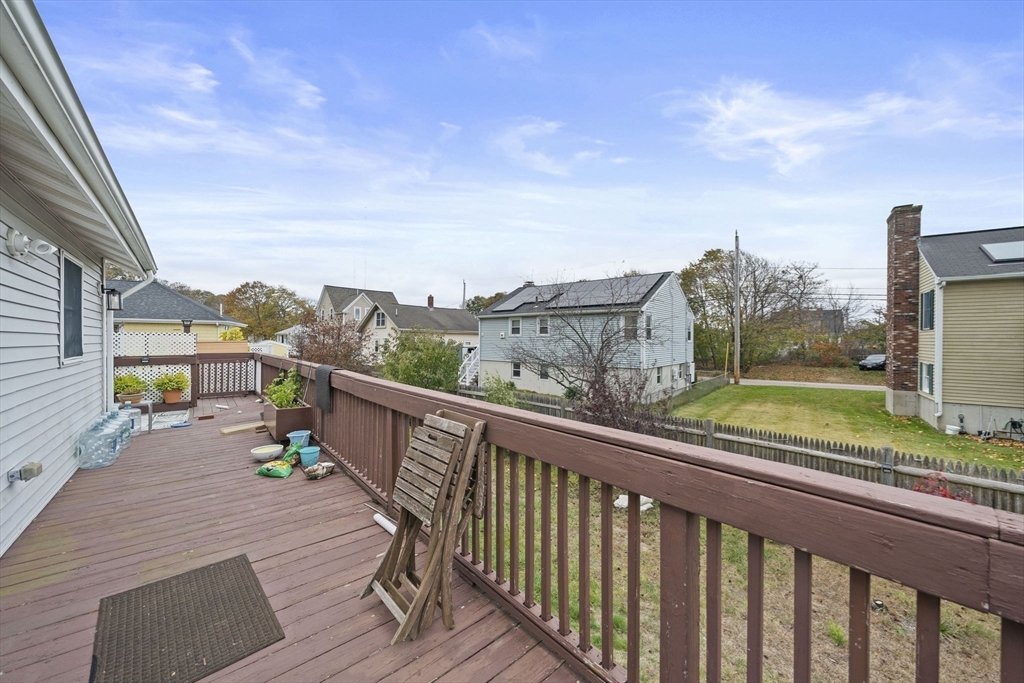 53 Mountford Road Hull, MA 02045 - Photo 27 of 35 a view of a balcony with wooden floor and iron stairs