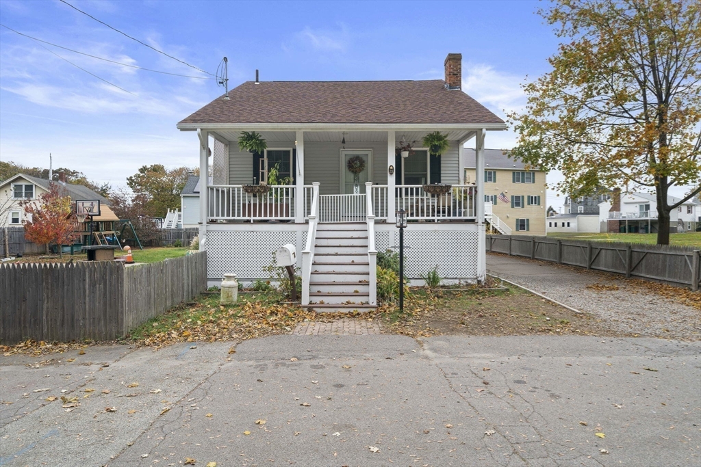 53 Mountford Road Hull, MA 02045 - Photo 29 of 35 a view of a white house with a large space and a yard