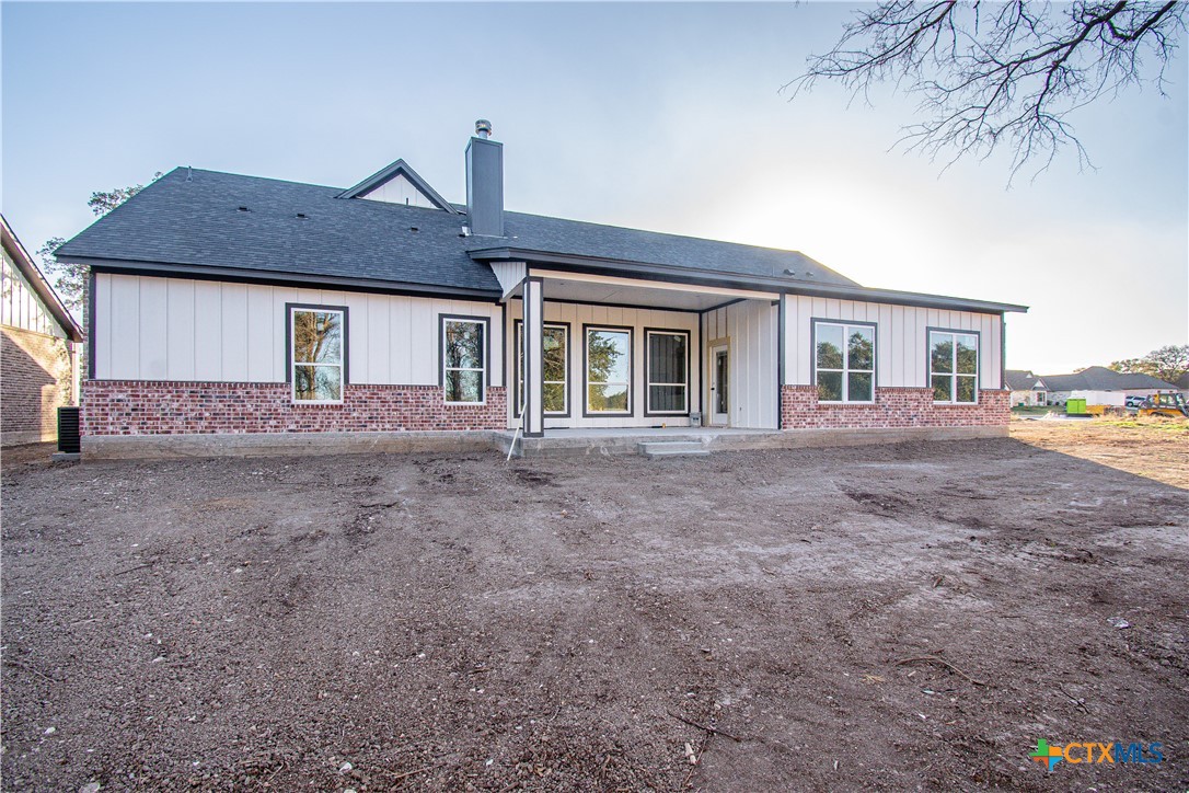 1306 Rylee Lane Salado, TX 76571 - Photo 2 of 4 a front view of a house with garden