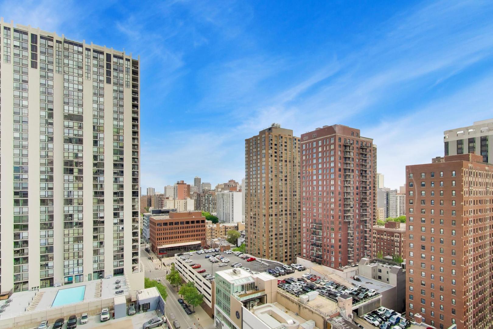 111 West Maple Street, Unit 1503 Chicago, IL 60610 - Photo 26 of 39 a view of a city with tall buildings
