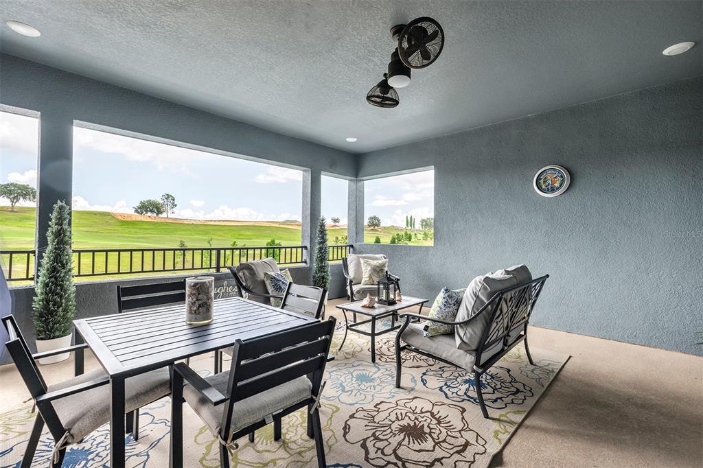 16136 Volterra Point Bella Collina, FL 34756 - Photo 36 of 64 a view of a dining room with furniture window and outside view