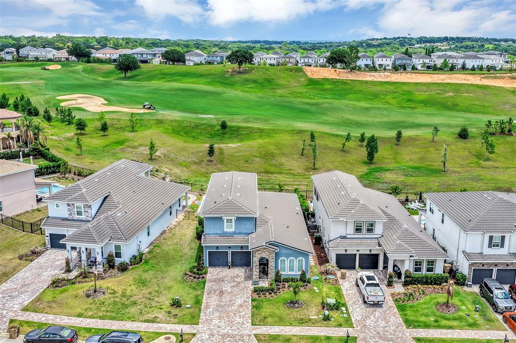 16136 Volterra Point Bella Collina, FL 34756 - Photo 48 of 64 an aerial view of a house with big yard