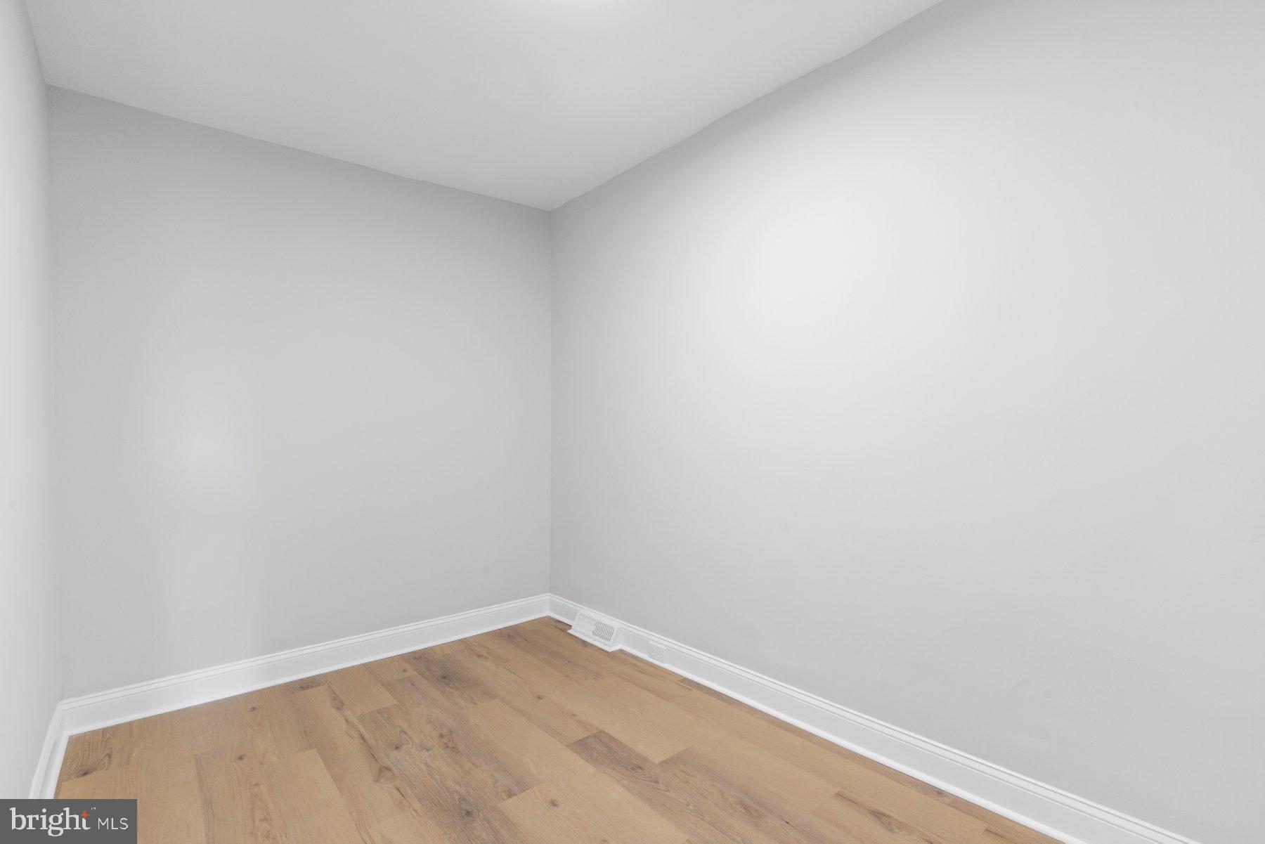 653 Bartlett Avenue Baltimore, MD 21218 - Photo 22 of 39 a view of an empty room