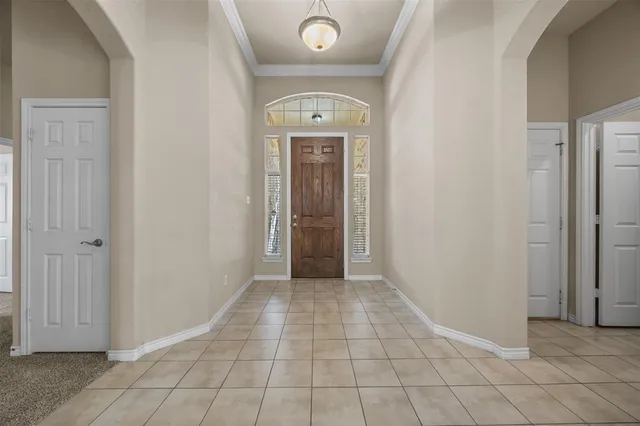 an empty room that has a window in it