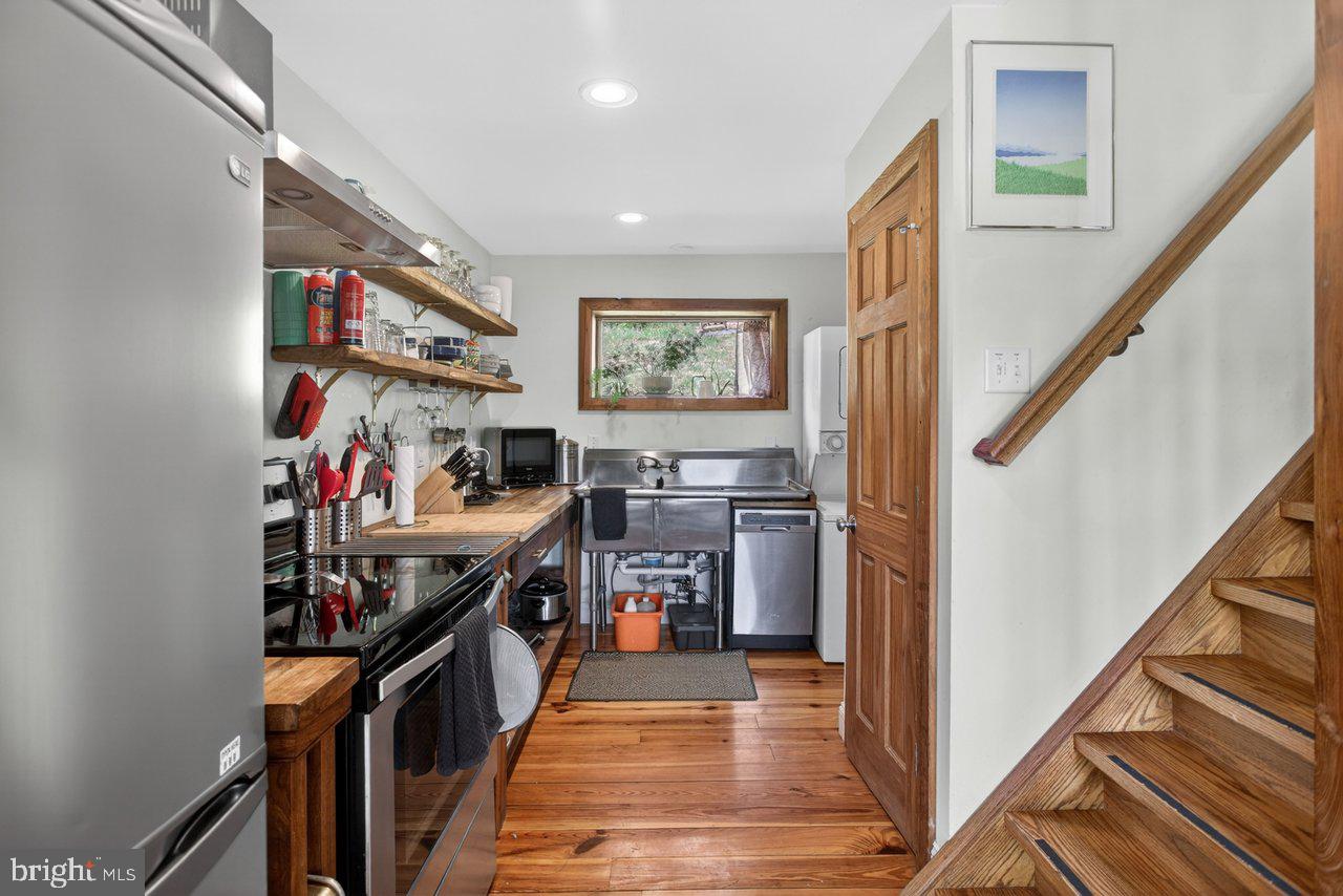 6261 South Page Valley Road Luray, VA 22835 - Photo 11 of 55 a open kitchen with stainless steel appliances granite countertop lots of counter top space