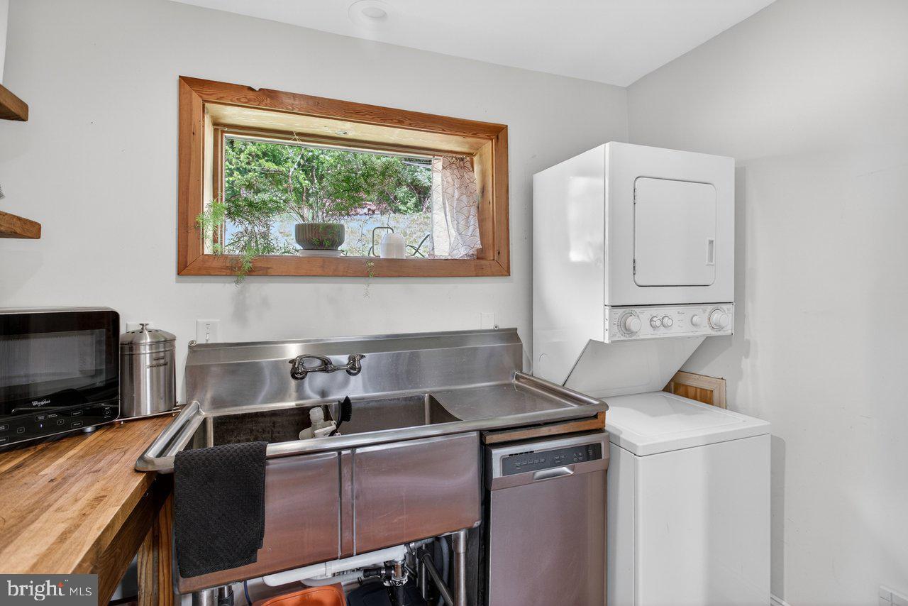 6261 South Page Valley Road Luray, VA 22835 - Photo 14 of 55 a kitchen with a stove and a sink